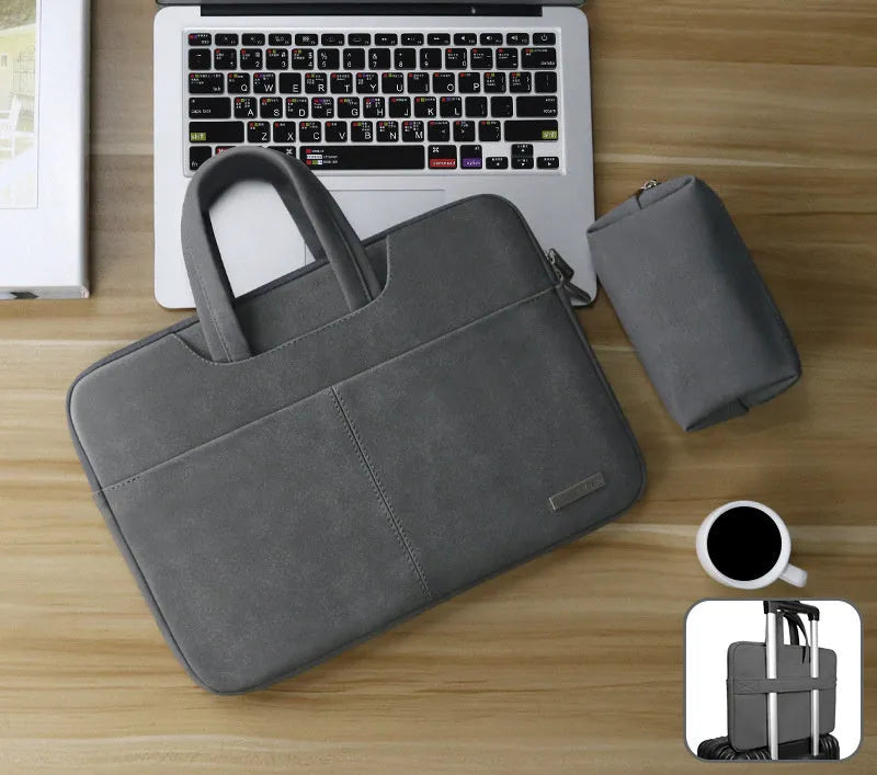 Blue PU leather laptop bag open showing internal organiser pockets for laptop, tablet and phone