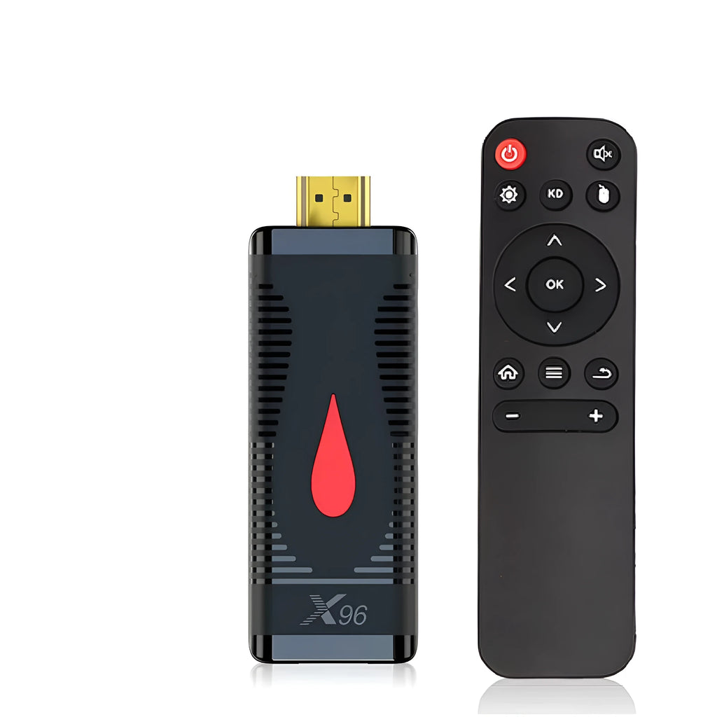 Android smart TV set-top box dongle with remote and cables on a wooden surface.
