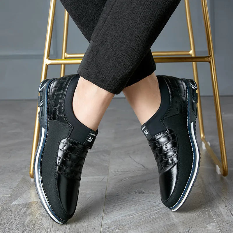 Men's casual leather shoes in black, blue, brown, and white colours showing low-top design with viscose soles