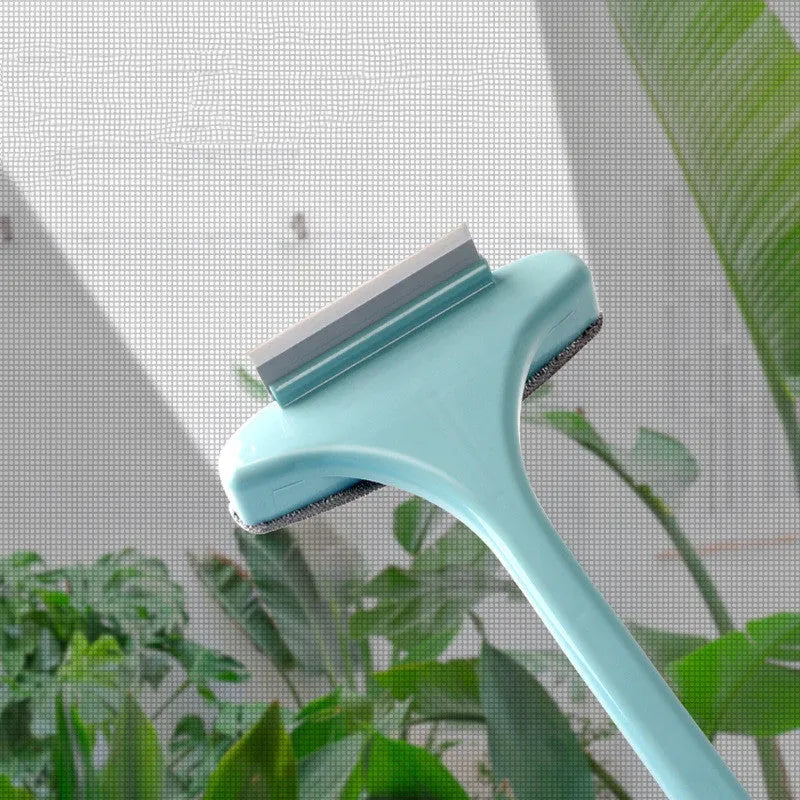 Blue and pink window screen cleaning brush with detachable crevice brush on a white background