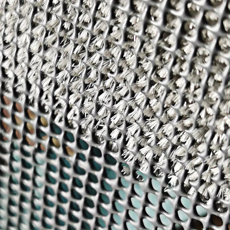Blue and pink window screen cleaning brush with detachable crevice brush on a white background
