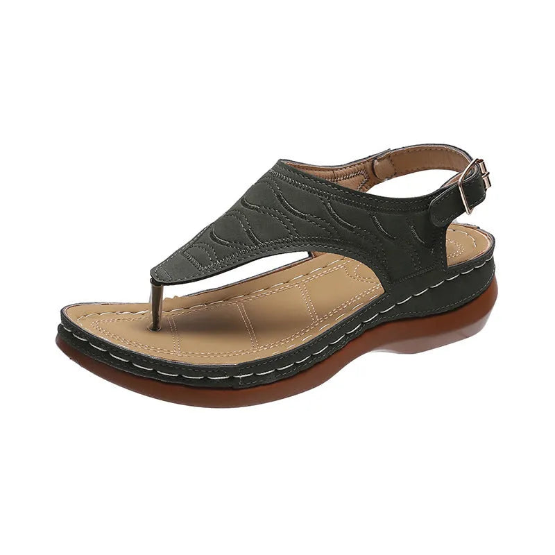 Women's casual wedge-heel sandals with adjustable buckle strap in a solid colour.