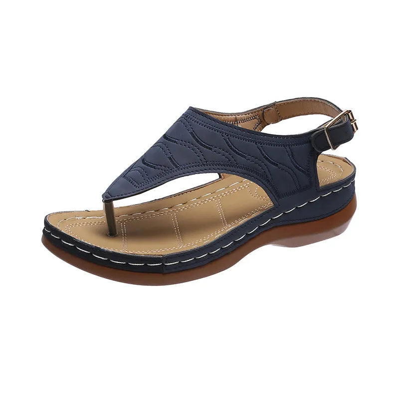 Women's casual wedge-heel sandals with adjustable buckle strap in a solid colour.