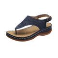 Women's casual wedge-heel sandals with adjustable buckle strap in a solid colour.