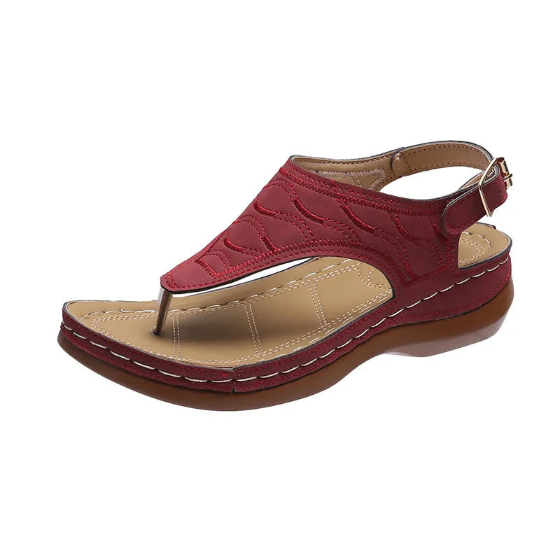 Women's casual wedge-heel sandals with adjustable buckle strap in a solid colour.