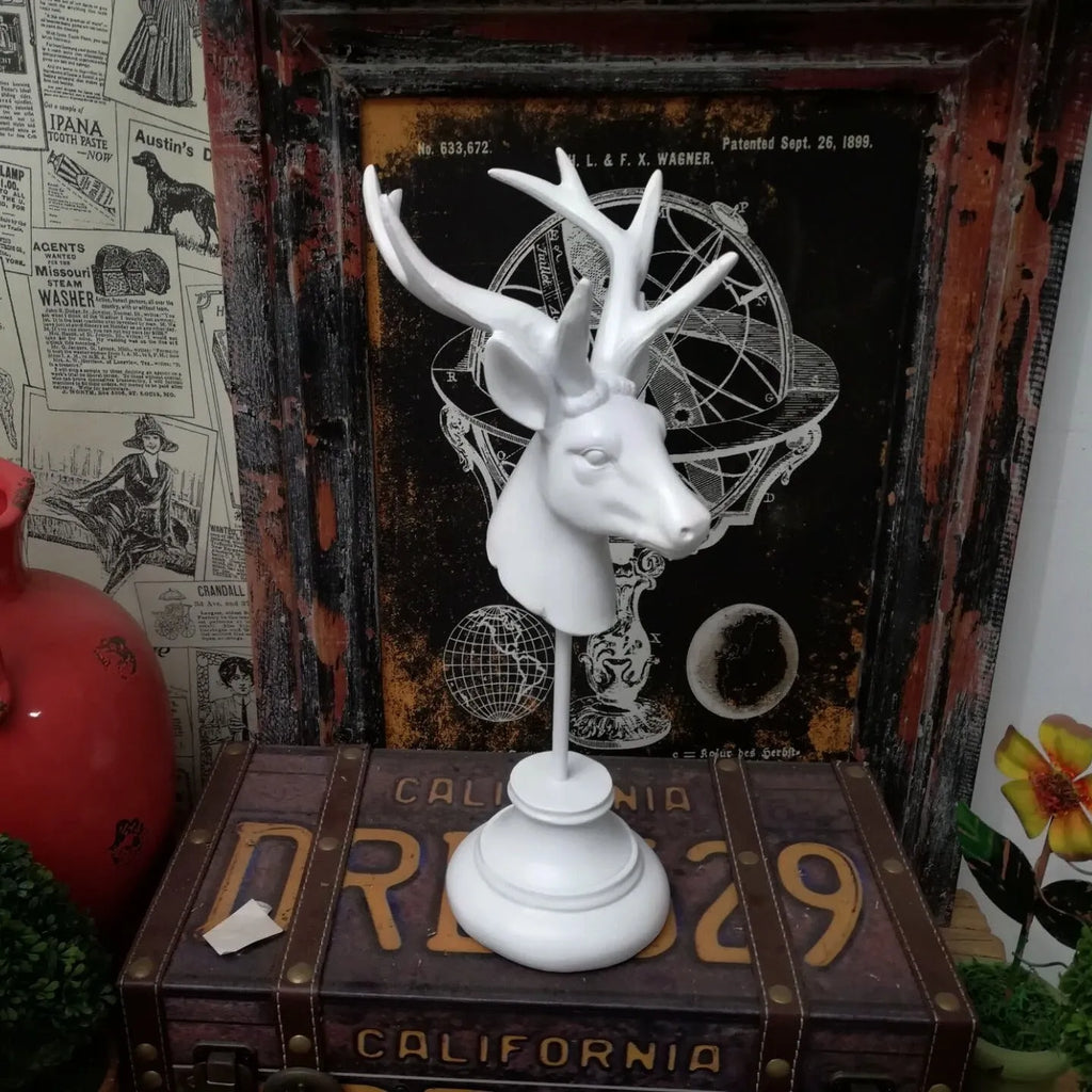 Large decorative resin animal statue ornament in black, white or wood colour, measuring 32cm tall.