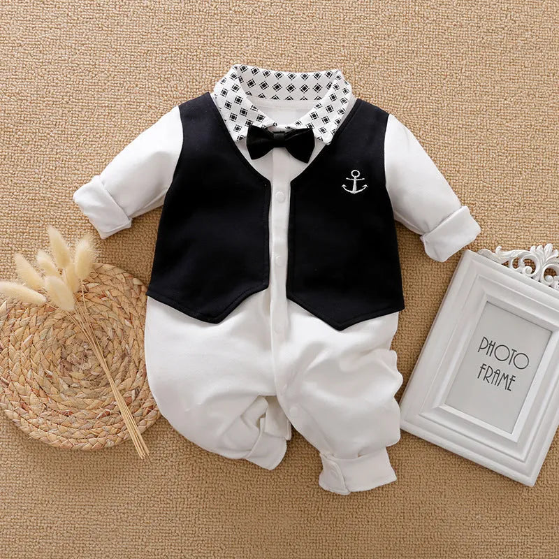 Baby boy in a long-sleeved cotton jumpsuit, gentleman style, for spring or autumn.