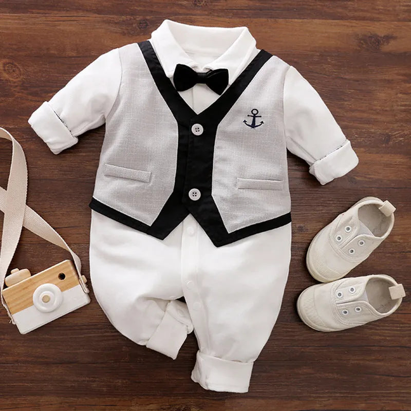 Baby boy in a long-sleeved cotton jumpsuit, gentleman style, for spring or autumn.