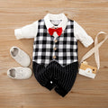 Baby boy in a long-sleeved cotton jumpsuit, gentleman style, for spring or autumn.
