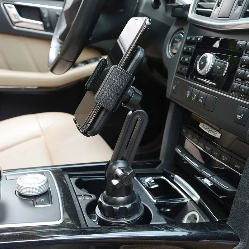 Black ABS car phone holder mounted on a dashboard, showing adjustable angle and height.