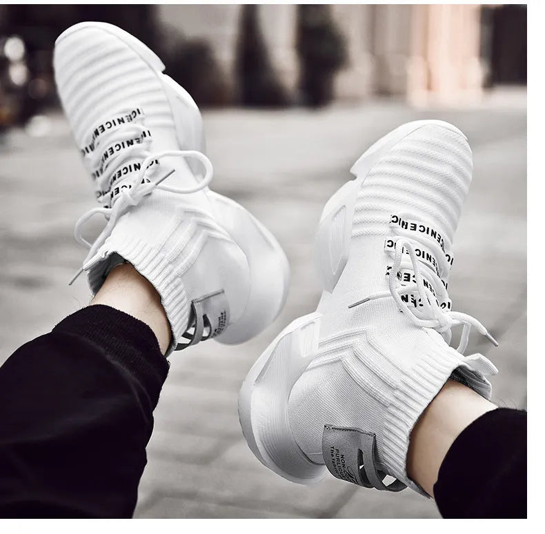 Men's black and white casual sports shoes with mesh lining available in sizes up to UK 47