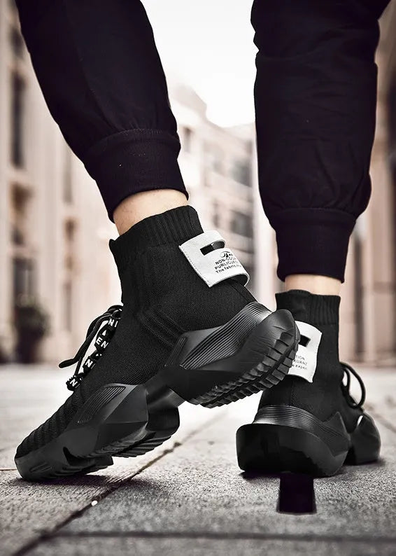 Men's black and white casual sports shoes with mesh lining available in sizes up to UK 47
