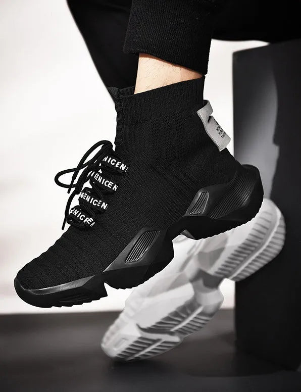 Men's black and white casual sports shoes with mesh lining available in sizes up to UK 47
