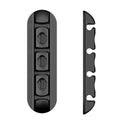 Black desktop magnetic cable organiser with soft plastic base on a desk.