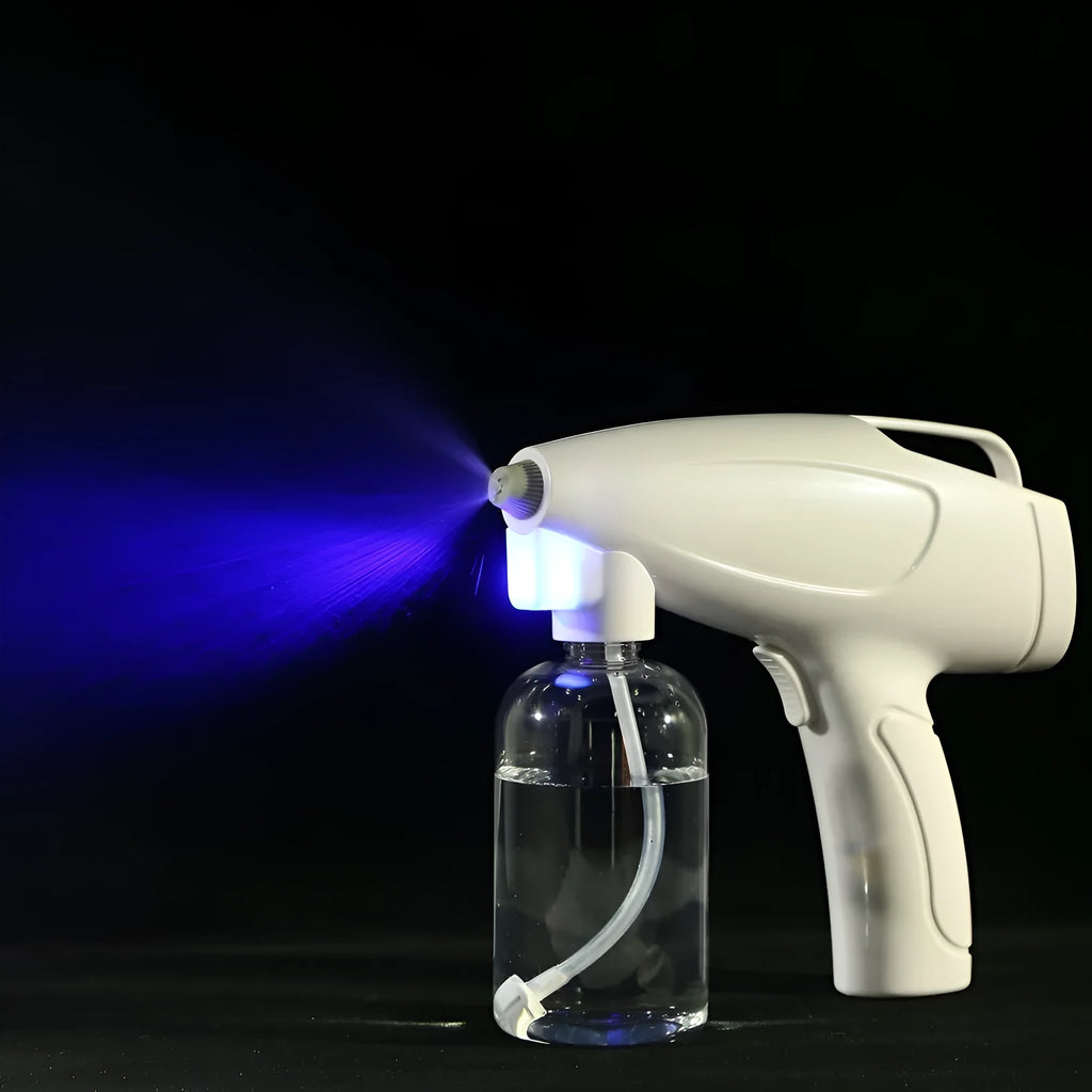 White handheld cordless electric spray gun with USB-C charging port on display