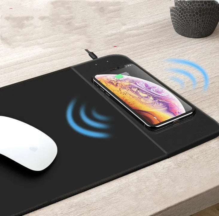 Wireless charging mouse pad with RGB lighting and cartoon design on cloth surface