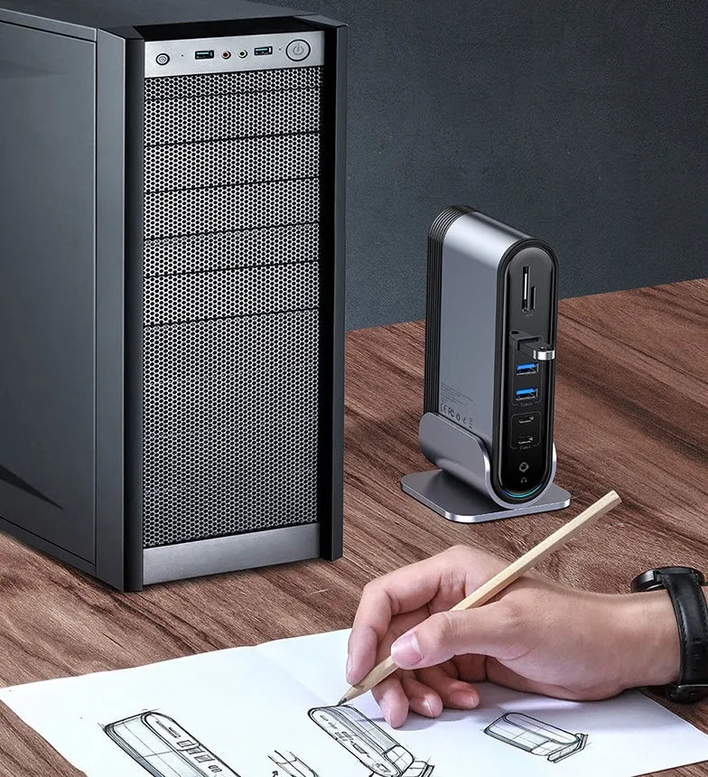 Deep space grey 16-in-1 Type-C docking station with external power supply on workstation desk