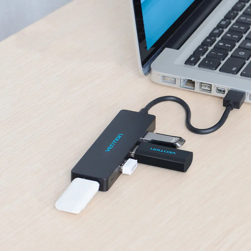 Black USB 3.0 hub with four ports and 0.15 metre cable