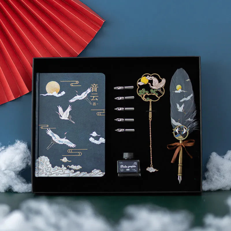 Chinese style feather pen and Jianhegui notebook set in a metal gift case with coloured feathers.
