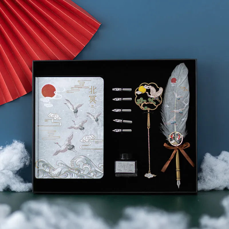 Chinese style feather pen and Jianhegui notebook set in a metal gift case with coloured feathers.