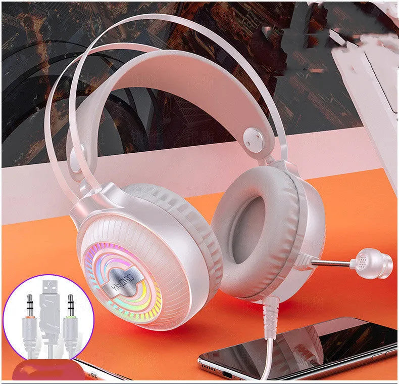 Black wired PC headset with microphone, large round earmuffs, and a long cable.
