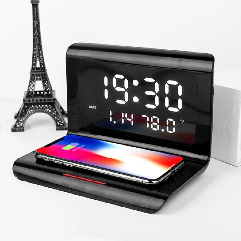 White wireless charger alarm clock showing time, date, temperature and humidity on display