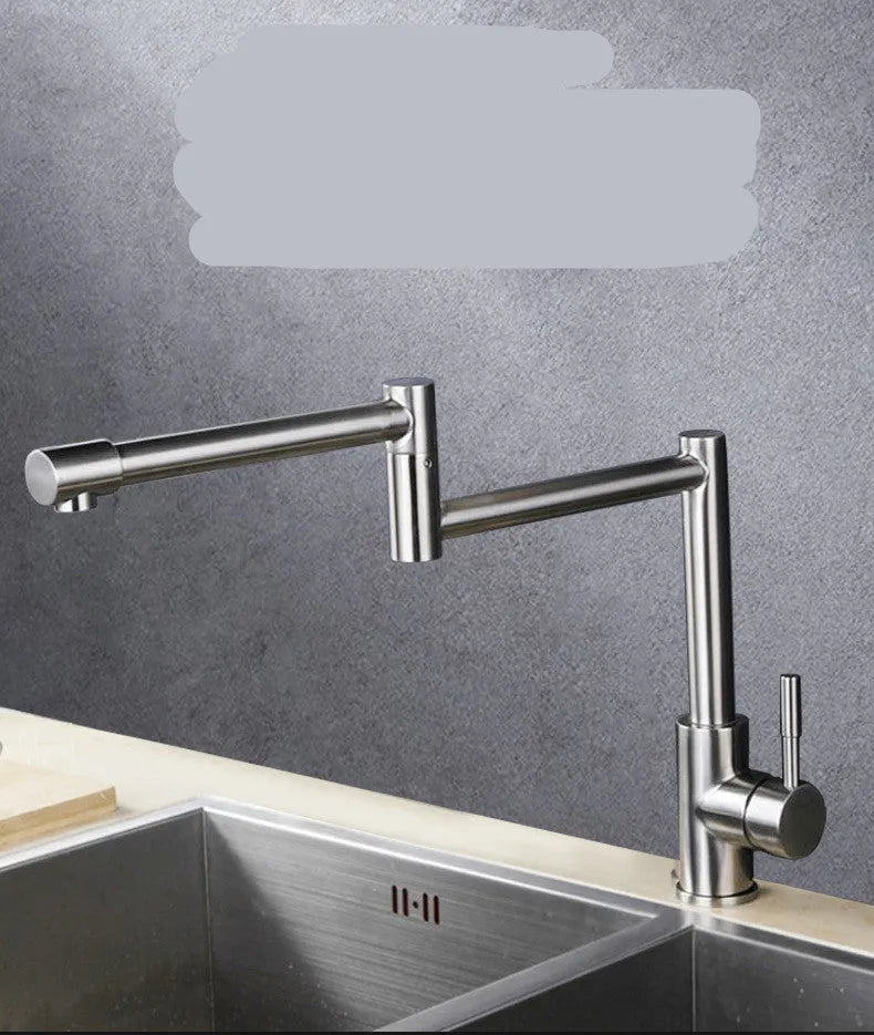 Silver stainless steel dual-handle kitchen faucet with a rotating spout.