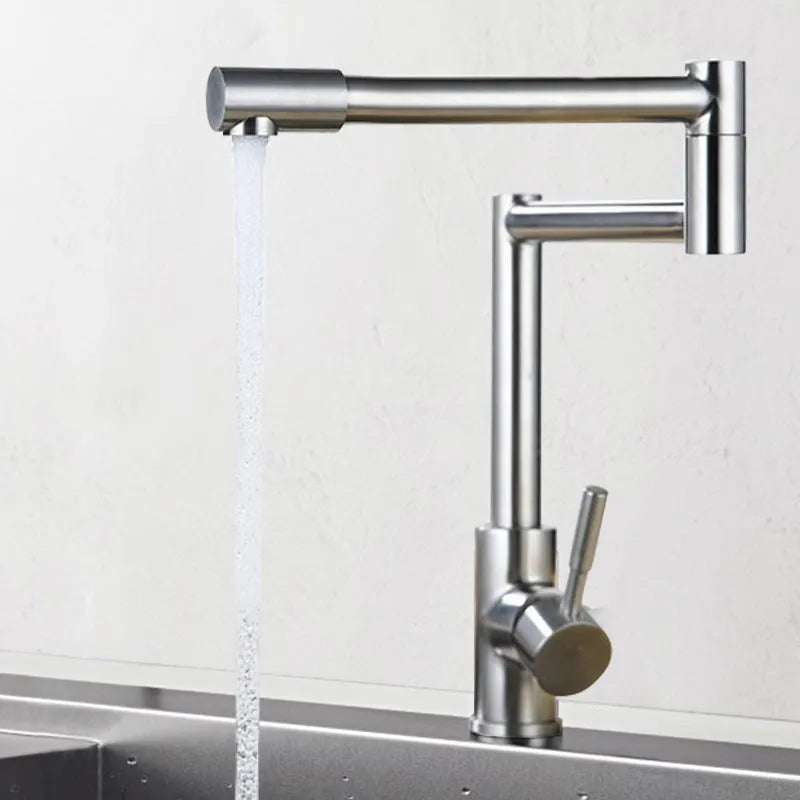 Silver stainless steel dual-handle kitchen faucet with a rotating spout.