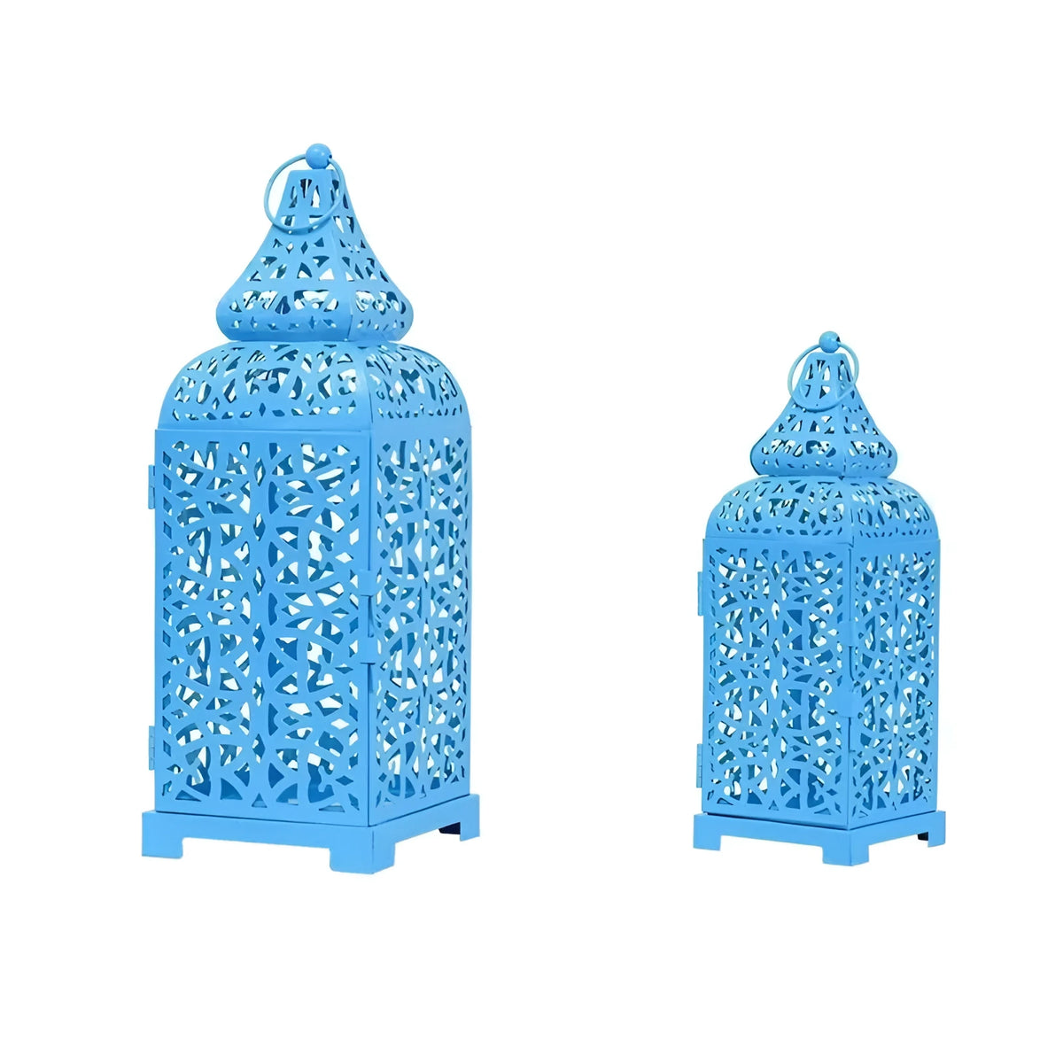 Blue geometric Moroccan iron lantern candlestick for tea lights on a table.