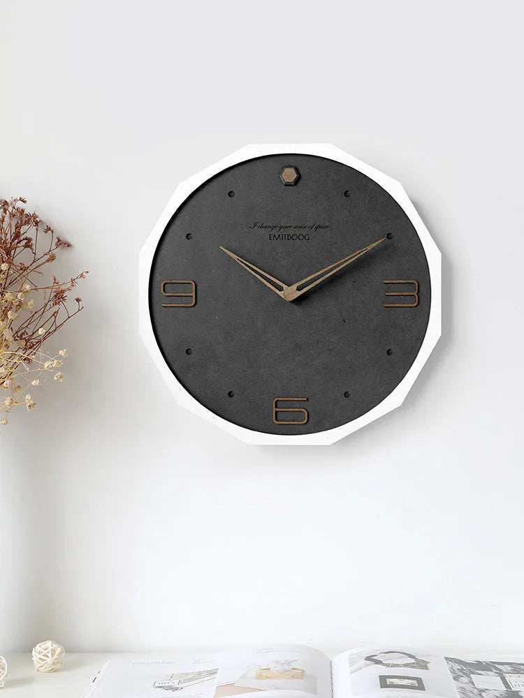 Round 12-inch Nordic style wall clock with Geralt material body and mirror face in minimalist living room setting