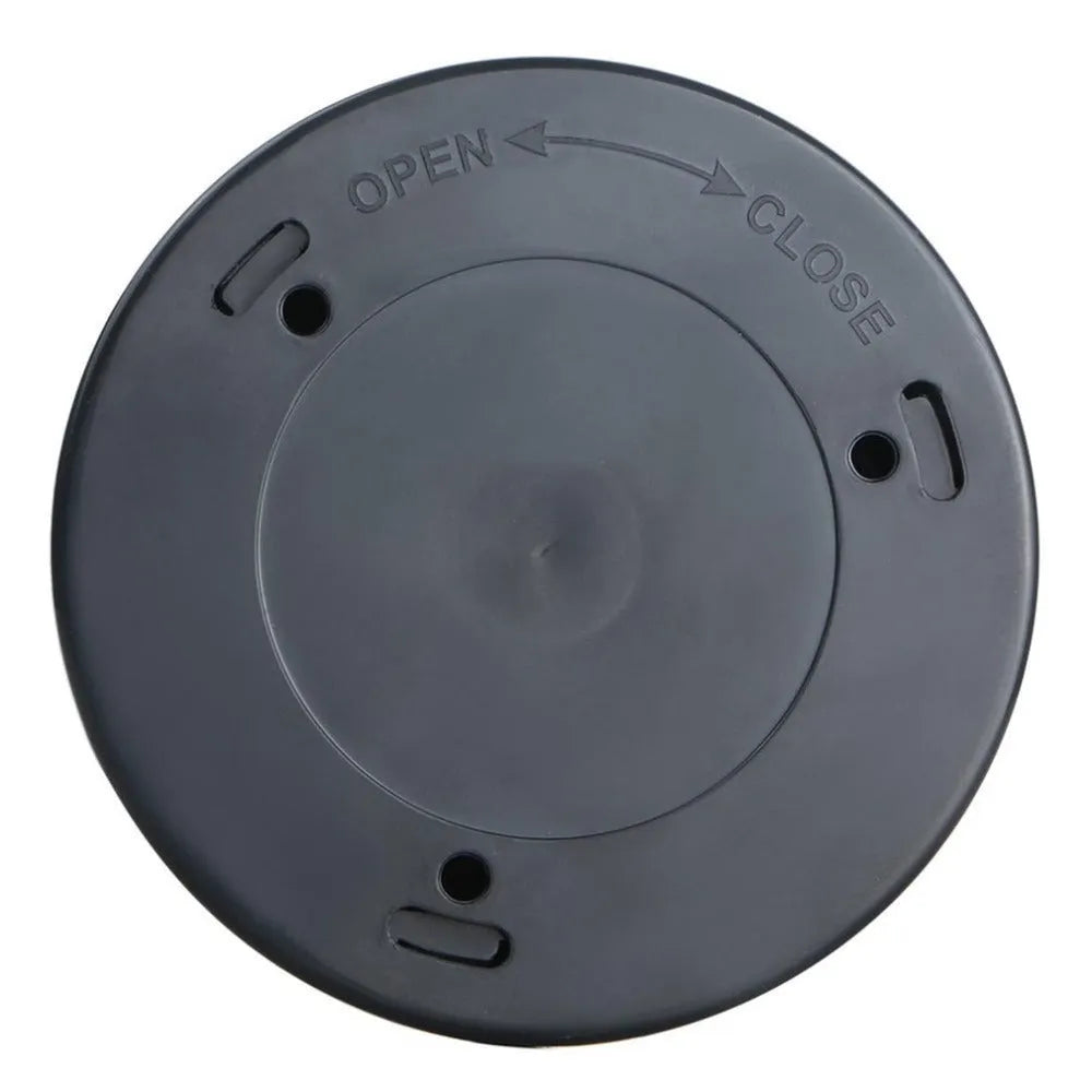 Silver circular wireless motion sensor night light on a table showing its 80mm diameter.
