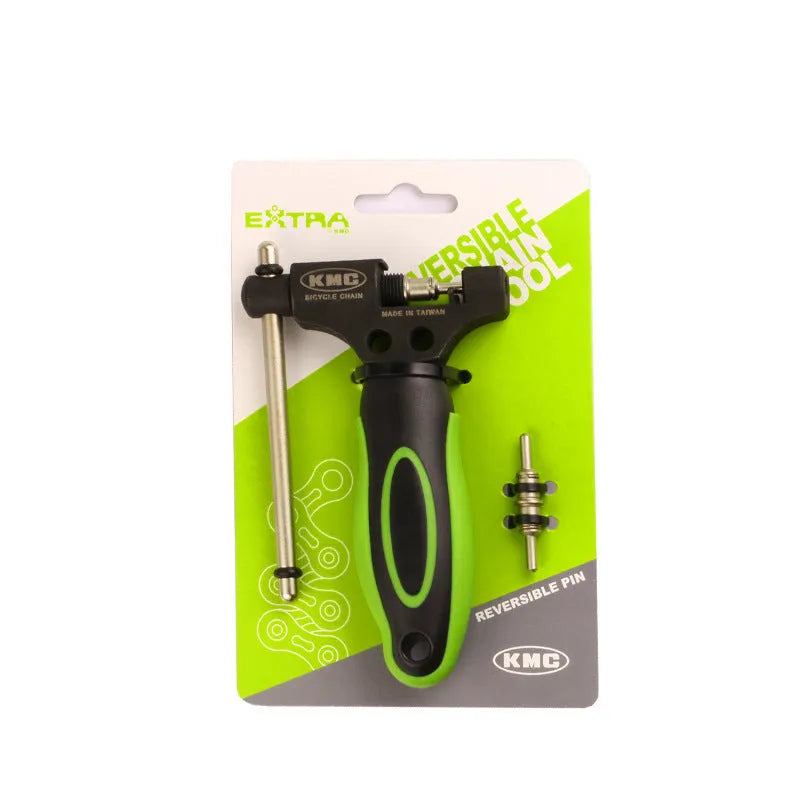Green steel bicycle chain cutter tool with a double shaft device and a separate chain driver on a white background.