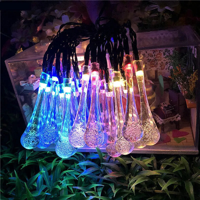 6.5 metre solar LED fairy lights with 30 warm white bulbs and bubble drop pendant design