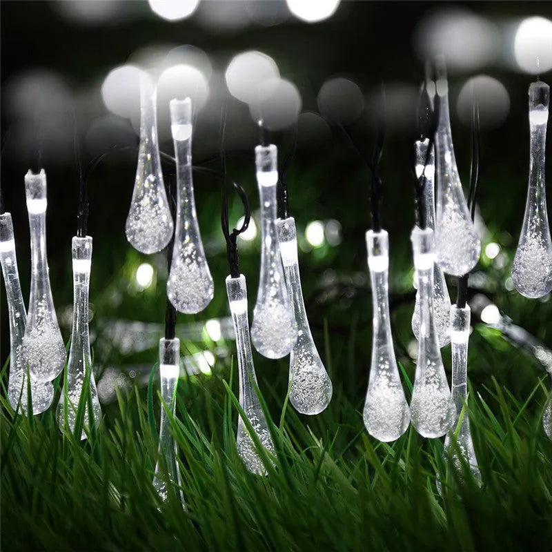 6.5 metre solar LED fairy lights with 30 warm white bulbs and bubble drop pendant design