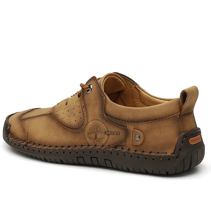 Men's black casual leather shoes with round toe and plain microfiber upper.