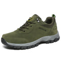 Men's low-top outdoor hiking shoes in army green, showing casual design and flexible viscose sole.