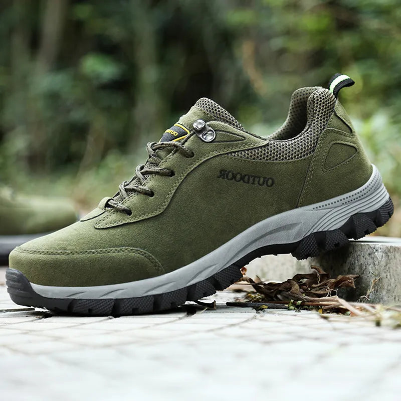 Men's low-top outdoor hiking shoes in army green, showing casual design and flexible viscose sole.