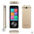 Small gold M9 electronic language translator for group chat and photo translation on a table.