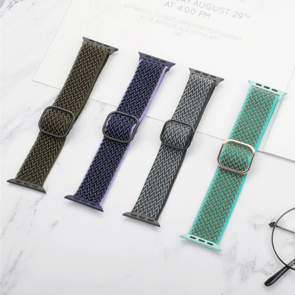 Braided nylon Apple Watch strap with a wave pattern, shown in a choice of colours on a wrist.