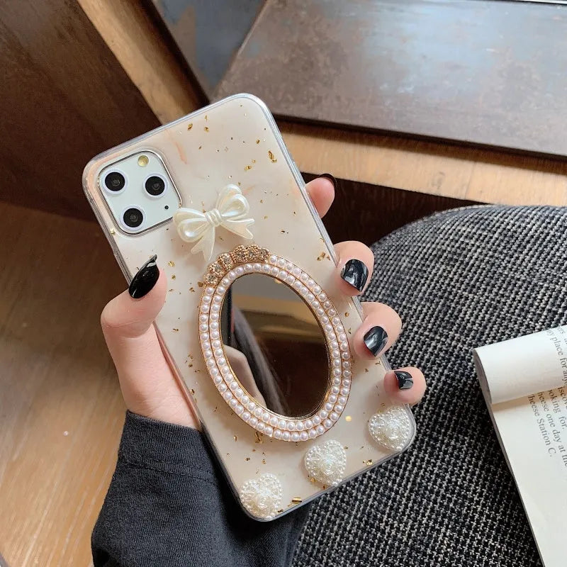 Brown marble pattern iPhone case with a rhinestone bowknot and mirrored back.