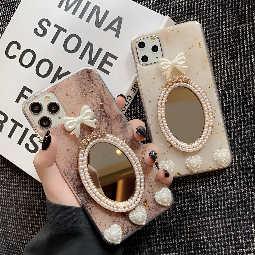 Brown marble pattern iPhone case with a rhinestone bowknot and mirrored back.