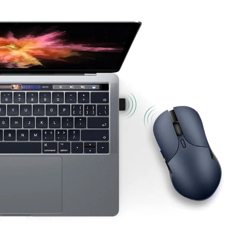 Blue Smart Voice Mouse with voice control button and 2.4G USB receiver on a desk.