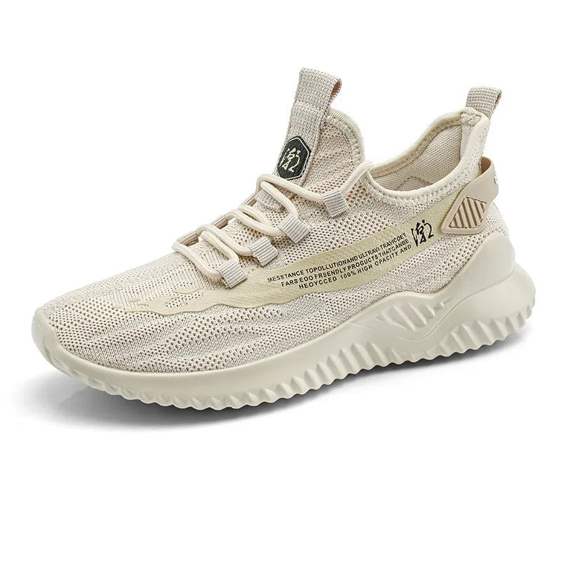Men's white low-top mesh sports sneakers with rubber sole on a plain background