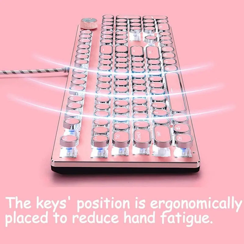 Queen Lipstick mechanical keyboard with pink keys on silver frame showing white backlighting
