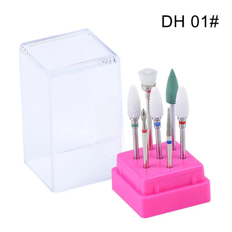 Tungsten steel nail drill bit set with six different bits and a brush in a clear case.