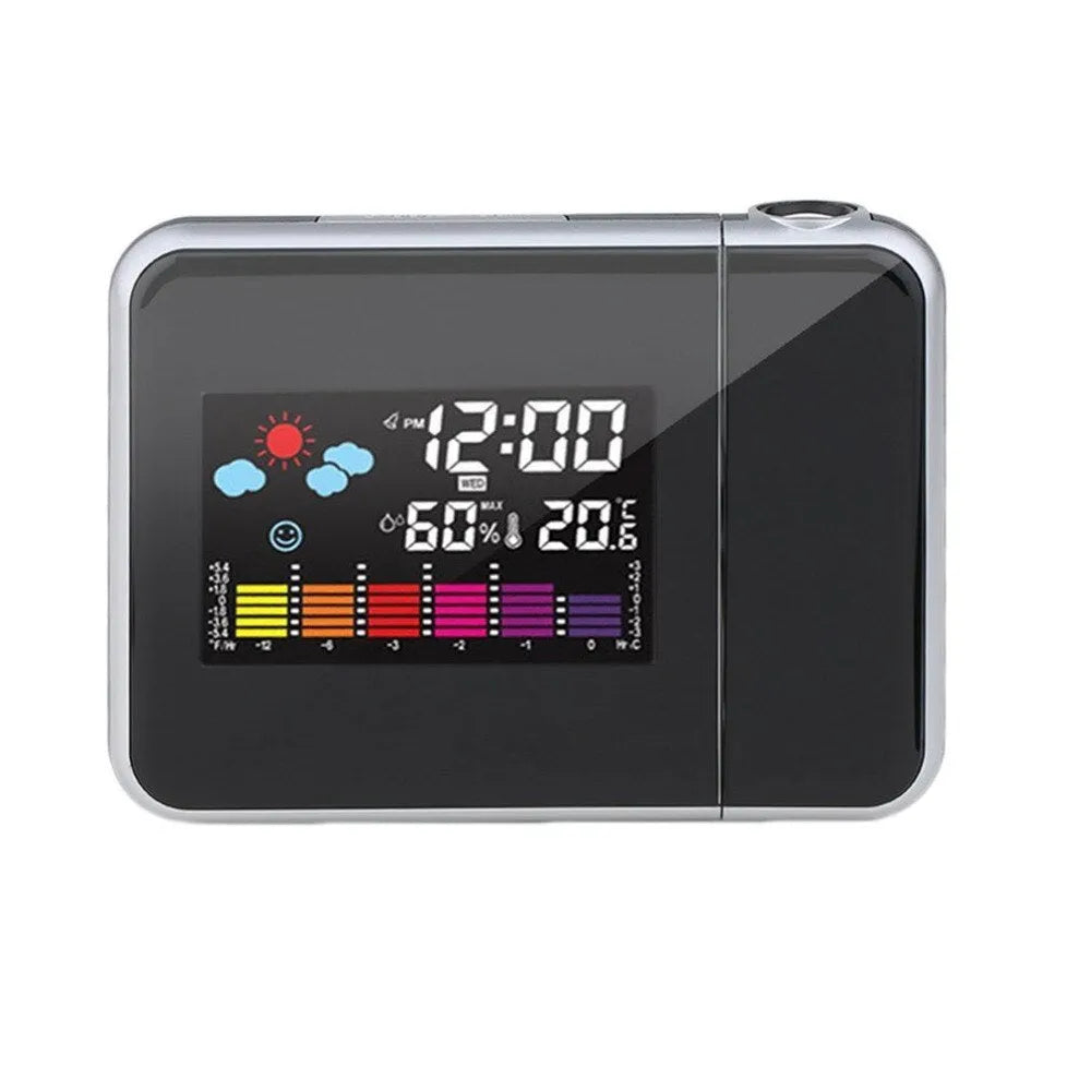 Black digital projection alarm clock with temperature and humidity display on bedside table