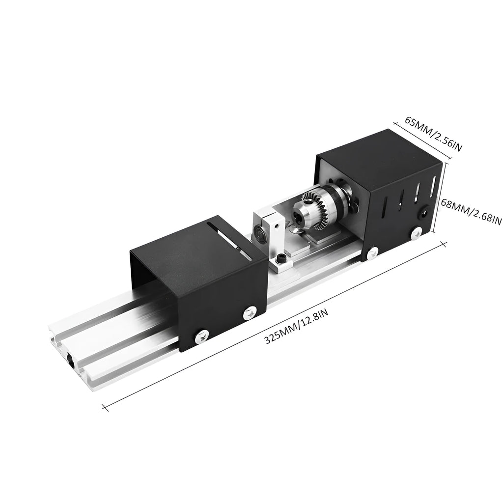Silver metal manual mini woodworking lathe with carving tools on a workbench.