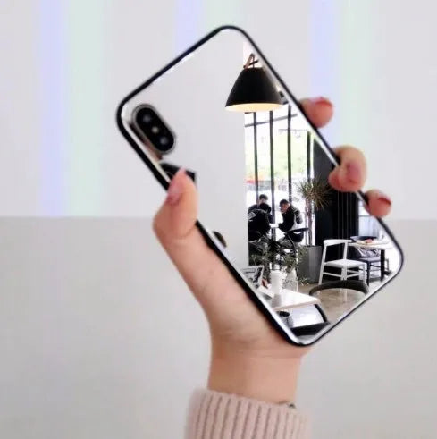Black iPhone back cover case with a built-in mirror on the rear, compatible with multiple iPhone models.