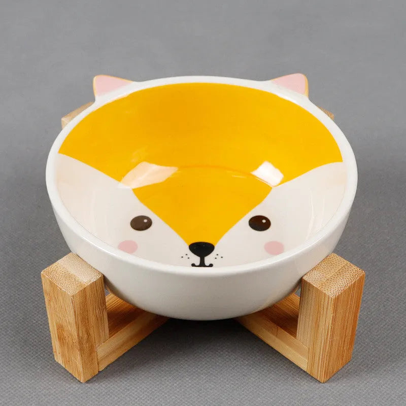 Raised ceramic cat food bowl in bamboo and wooden bracket, 13cm pottery dish, pink-eared fox design