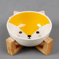 Raised ceramic cat food bowl in bamboo and wooden bracket, 13cm pottery dish, pink-eared fox design